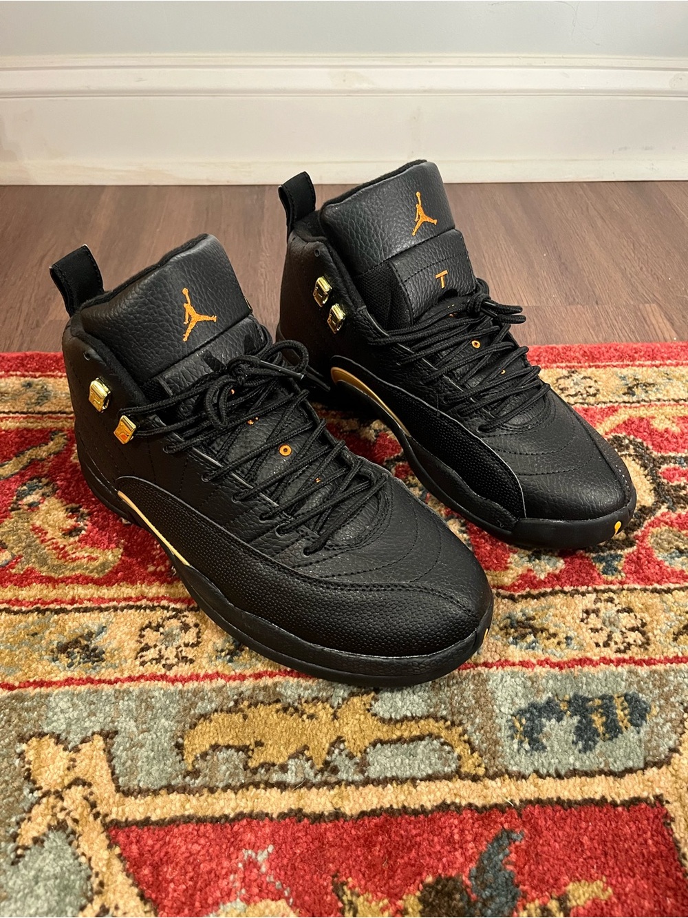 Jordan Retro High Top Sneakers in Black and Gold 8.5